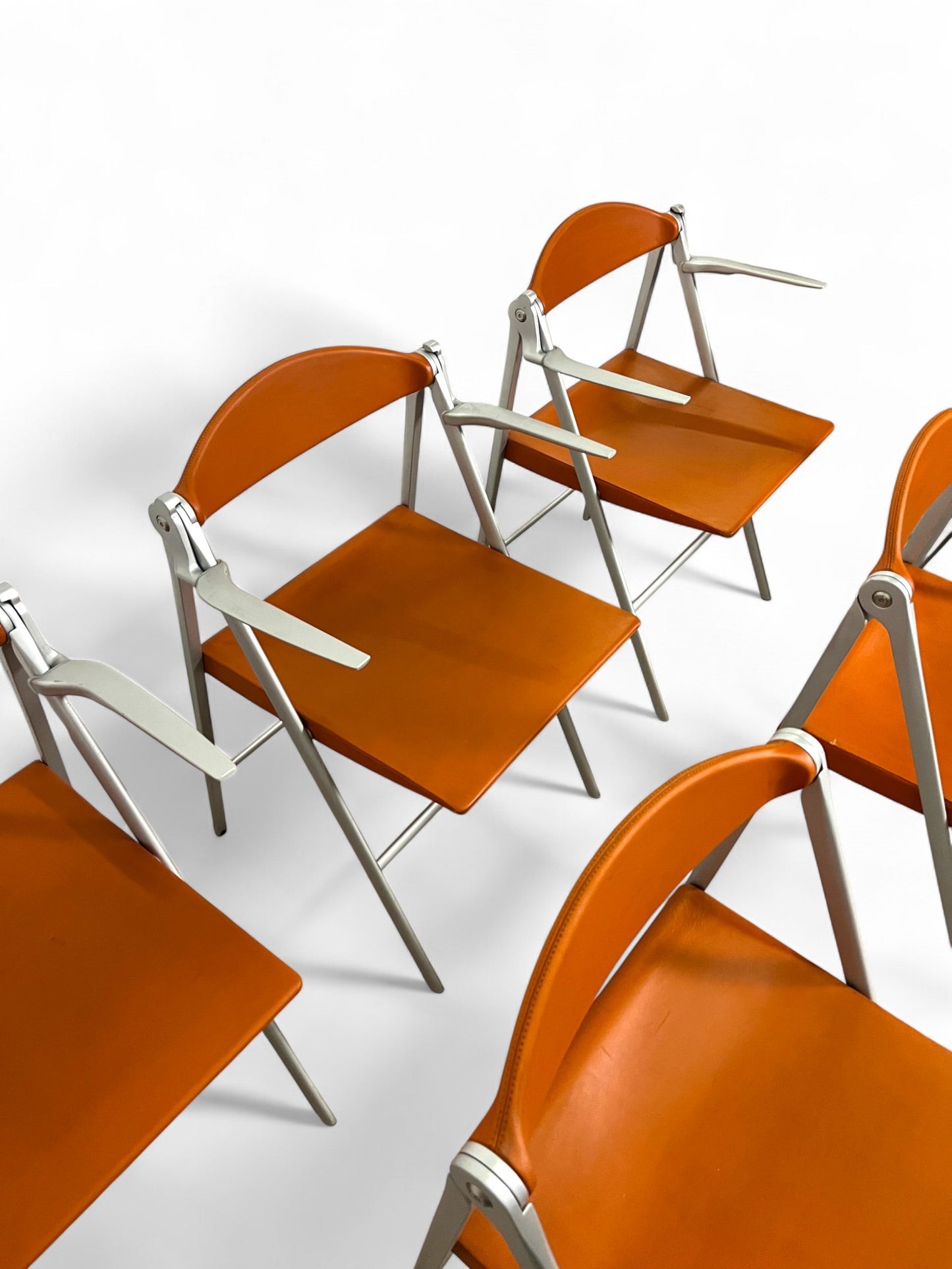 Lot de six chaises pliantes Donald, Studio Cerri & Associati, Poltrona Frau