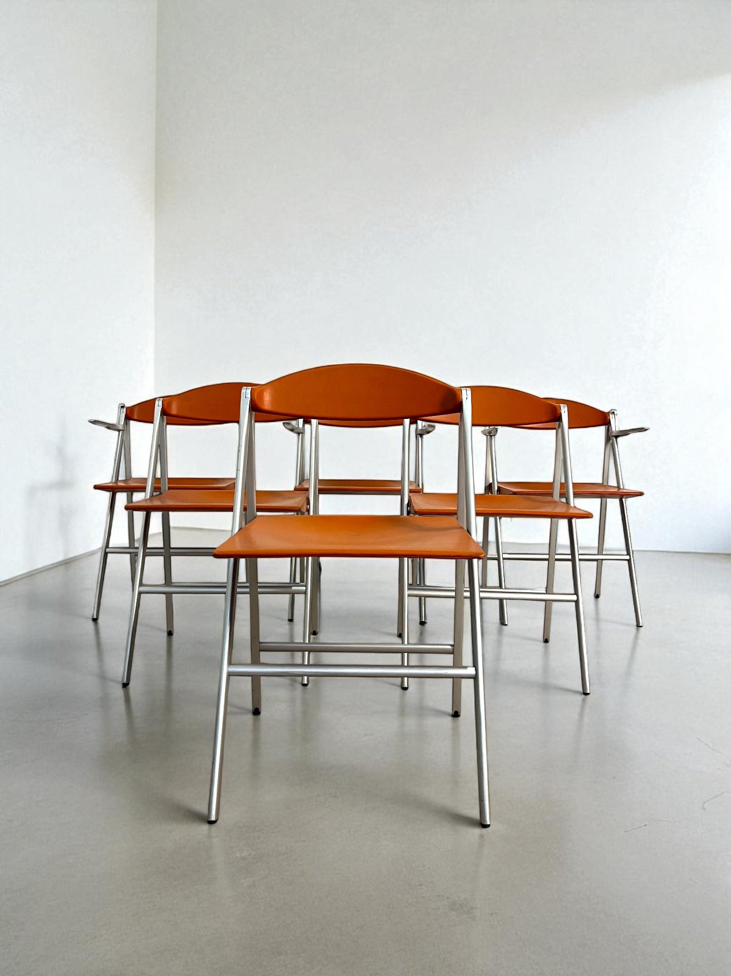Lot de six chaises pliantes Donald, Studio Cerri & Associati, Poltrona Frau