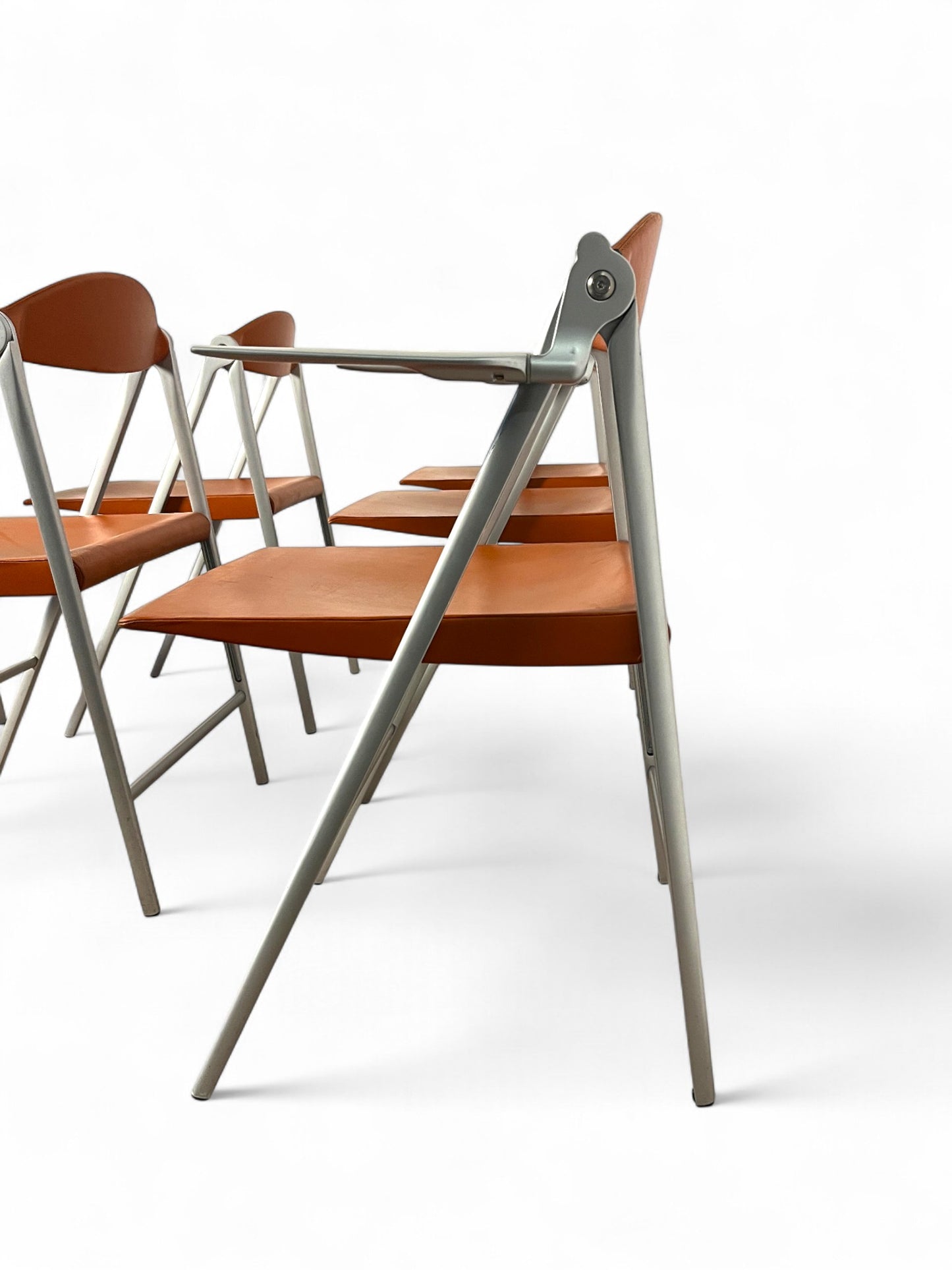 Lot de six chaises pliantes Donald, Studio Cerri & Associati, Poltrona Frau