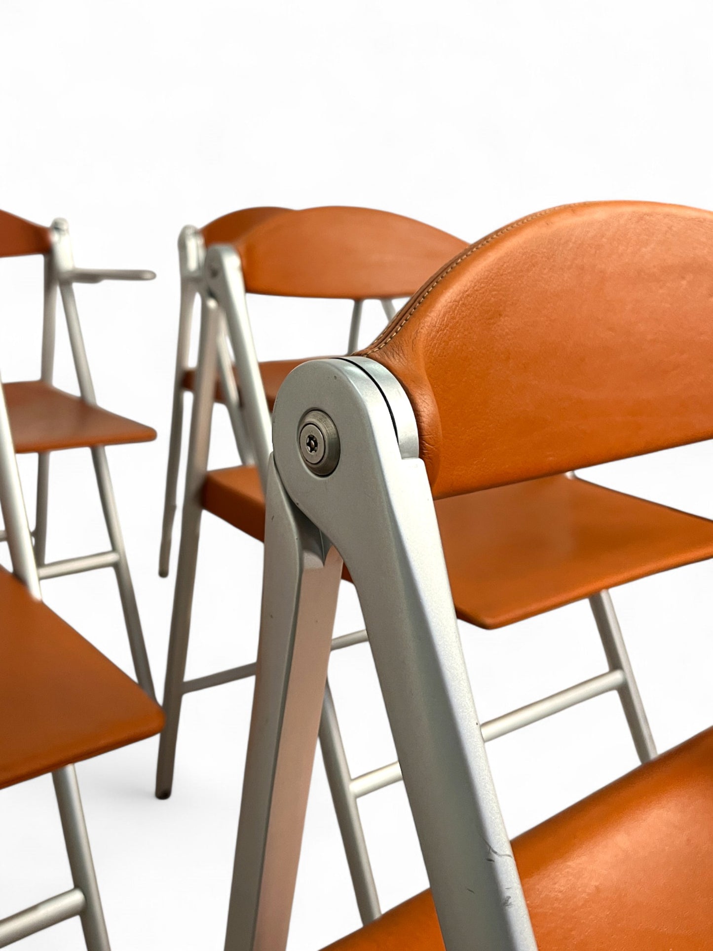 Lot de six chaises pliantes Donald, Studio Cerri & Associati, Poltrona Frau